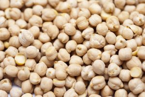 Background of chickpeas, or garbanzo beans, a seed of the Cicer arietinum plant which is high in protein and was one of the first vegetables to be cultivated